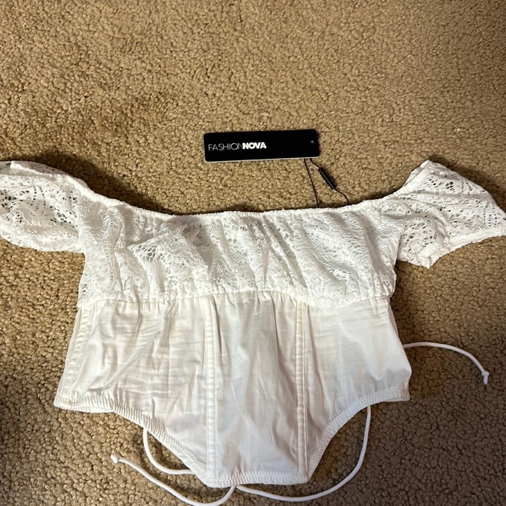 Size Small, white lace corset top. Never worn. Brand new